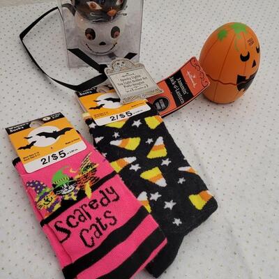 Lot 118: Assorted NEW Halloween Women's Socks, Tea Light Holder Set + Hallmark JAMMIN JACK-O-LANTERN (Works)