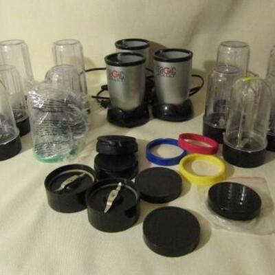 Collection of Magic Bullet Compact Blenders with Cups and Accessories