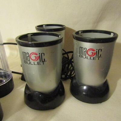 Collection of Magic Bullet Compact Blenders with Cups and Accessories
