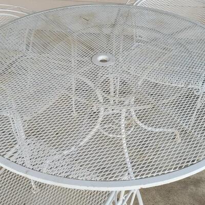 Lot 131: Vintage Wrought Iron Outdoor Table & Chairs 