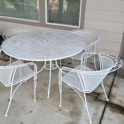 Lot 131: Vintage Wrought Iron Outdoor Table & Chairs 