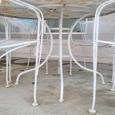 Lot 131: Vintage Wrought Iron Outdoor Table & Chairs 
