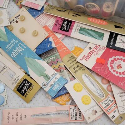 Lot 149: Assorted Sewing Essentials- Thread, Buttons, Zippers and More