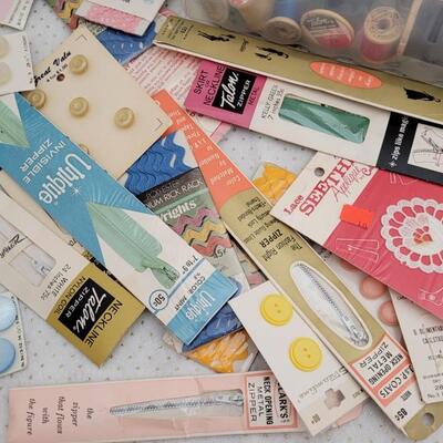 Lot 149: Assorted Sewing Essentials- Thread, Buttons, Zippers and More