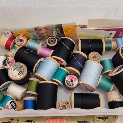 Lot 149: Assorted Sewing Essentials- Thread, Buttons, Zippers and More