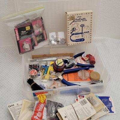 Lot 164: Assorted Sewing Essentials Bundle - Rhinestone Setters, Fabric Rulers and More