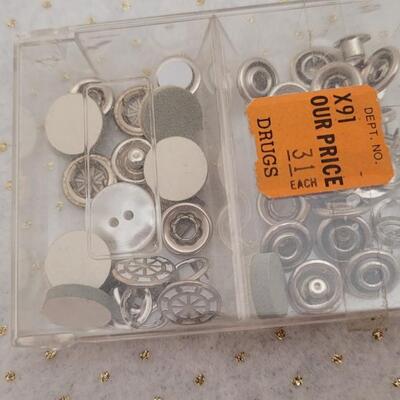 Lot 164: Assorted Sewing Essentials Bundle - Rhinestone Setters, Fabric Rulers and More