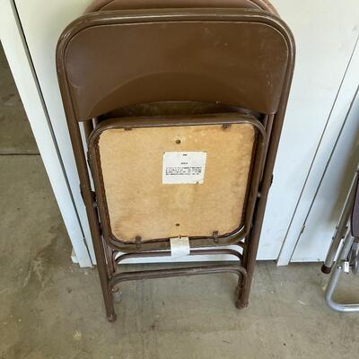 #579 (2) Metal Folding Chairs. 