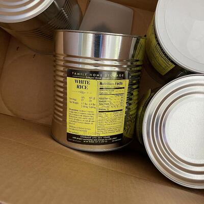 #594 4 Number 10 Cans of White Rice 