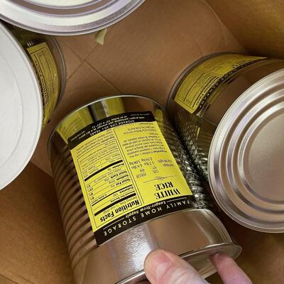 #594 4 Number 10 Cans of White Rice 