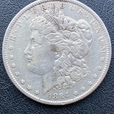 1884 Morgan silver dollar. Lot A11