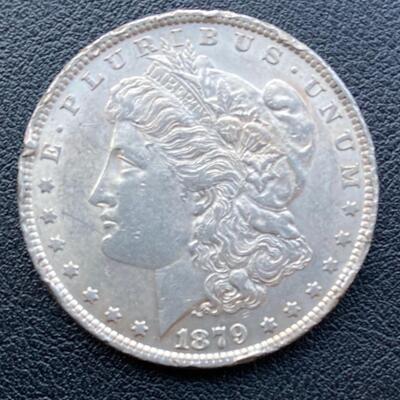 1879 Morgan silver dollar. Lot A13