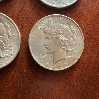 Peace silver dollar collection of four. Includes 1922, 1923, 1924, 1926. Lot A18