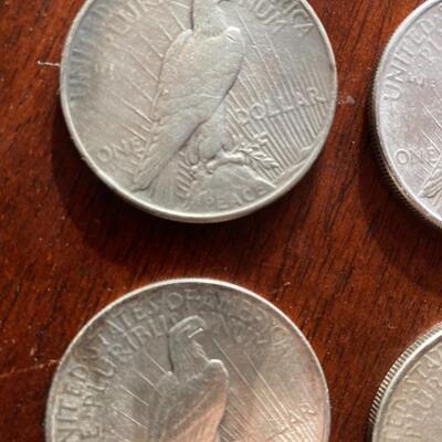 Peace silver dollar collection of four. Includes 1922, 1923, 1924, 1926. Lot A18