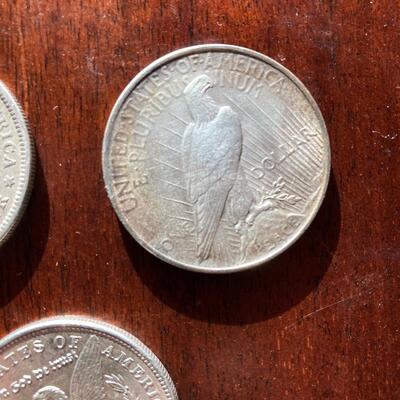 Antique silver dollar collection of three. Includes 1885, 1889, 1922. Lot A19