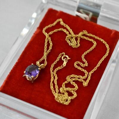 Costume Jewelry: Gold-tinted Necklace w Purple Rock, in Clear Case w Red Pillow