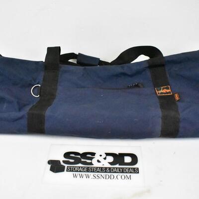 Extra Large Duffle Bag by Compass. Navy Blue with Black handles. Hole on corner
