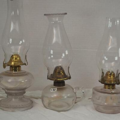 Lot 48- Oil Lamps Three Antique glass flat wick Finger lamps