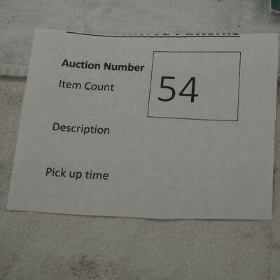 Lot 54- Iron show plates, Plastic storage bin, sewing machine foot plates, and supplies