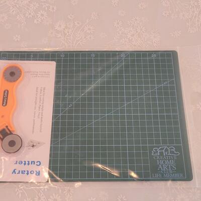 Lot 199: Mat and Rotary Cutting Tool