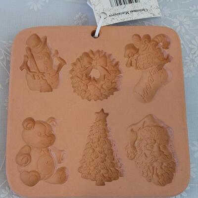 Lot 204: Christmas Candle/Paper Molds
