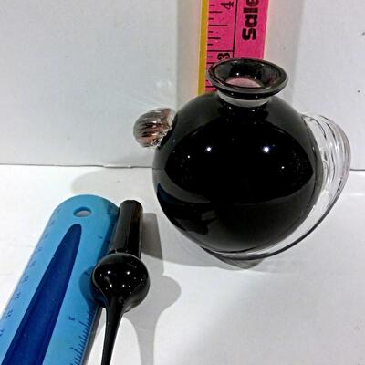 Art glass ebony bottle and applicator with clear wave swirls on side