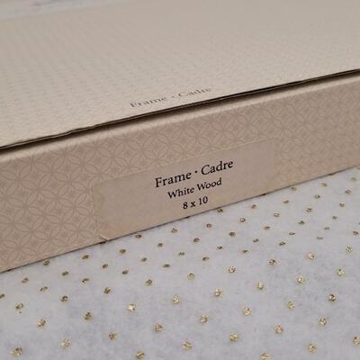 Lot 215: New Hallmark White Wood 8x10 Frame 
