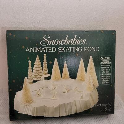 Lot 236: New Vintage Dept. 56 SNOWBABIES Animated Skating Pond