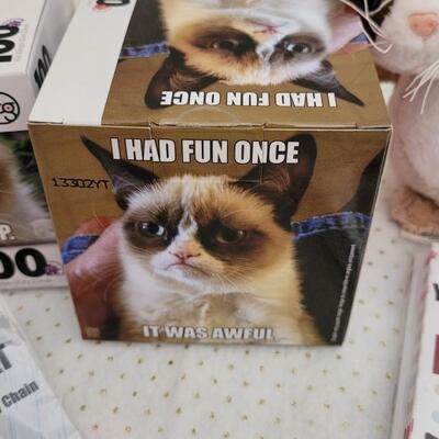Lot 241: Assorted NEW GRUMPY CAT Collectibles 