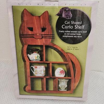 Lot 242: New Cat Shaped Curio Cabinet 