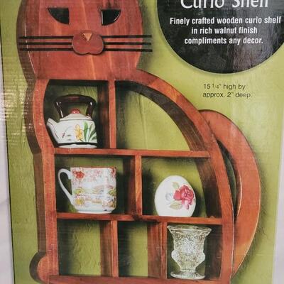 Lot 242: New Cat Shaped Curio Cabinet 