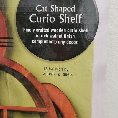 Lot 242: New Cat Shaped Curio Cabinet 