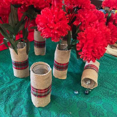 Lot of seven homemade vases: burlap cover jars with red flowers