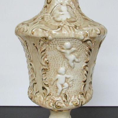 Very Tall Decorative Lamp Cherubs and Dolphin Feet in Brass