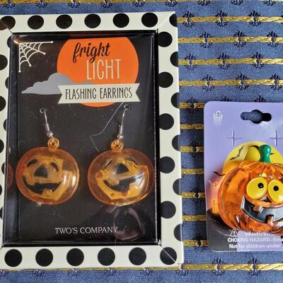 Lot 252: Flashing Pumpkin Earrings and Brooch