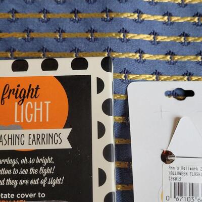Lot 252: Flashing Pumpkin Earrings and Brooch