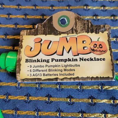 Lot 259: (3) Jumbo Blinking Pumpkin Necklaces