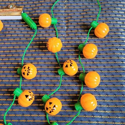 Lot 259: (3) Jumbo Blinking Pumpkin Necklaces