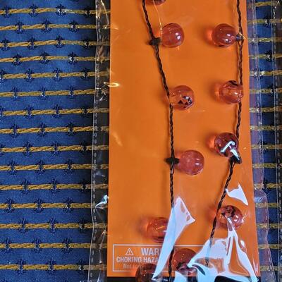 Lot 265: Flashing Halloween Necklaces, Hair Glitter and Bracelets 