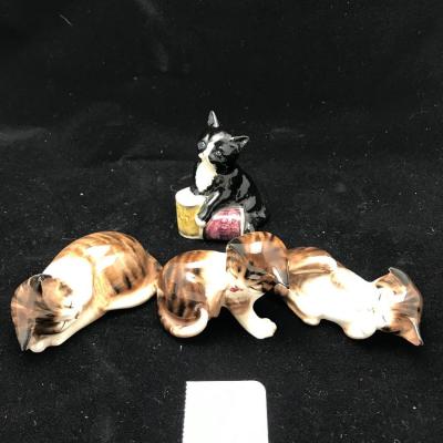 Four Royal Doulton Cats