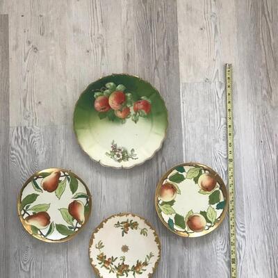 Four Vintage Plates with Hangers 