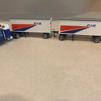 Pie semi truck with 2 trailers 