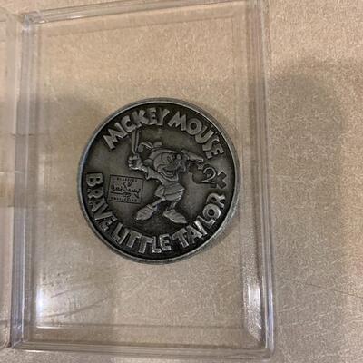 Mickey turn of the century coin 