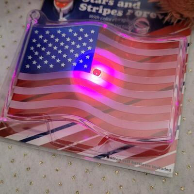 Lot 293: Assorted NEW Patriotic Items - Singing Bear, 4th of July Glow Batons + LED Flag