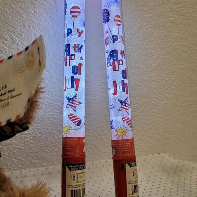 Lot 293: Assorted NEW Patriotic Items - Singing Bear, 4th of July Glow Batons + LED Flag
