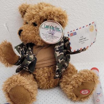Lot 293: Assorted NEW Patriotic Items - Singing Bear, 4th of July Glow Batons + LED Flag