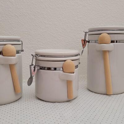 Lot 294: Set of (3) GIBSON Graduated Canisters w/ Spoon Accent 