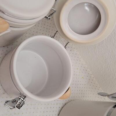 Lot 294: Set of (3) GIBSON Graduated Canisters w/ Spoon Accent 