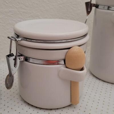 Lot 294: Set of (3) GIBSON Graduated Canisters w/ Spoon Accent 