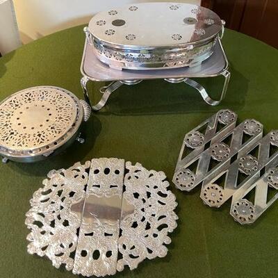 Lot 304  Silver Plate Trivets & Warmers